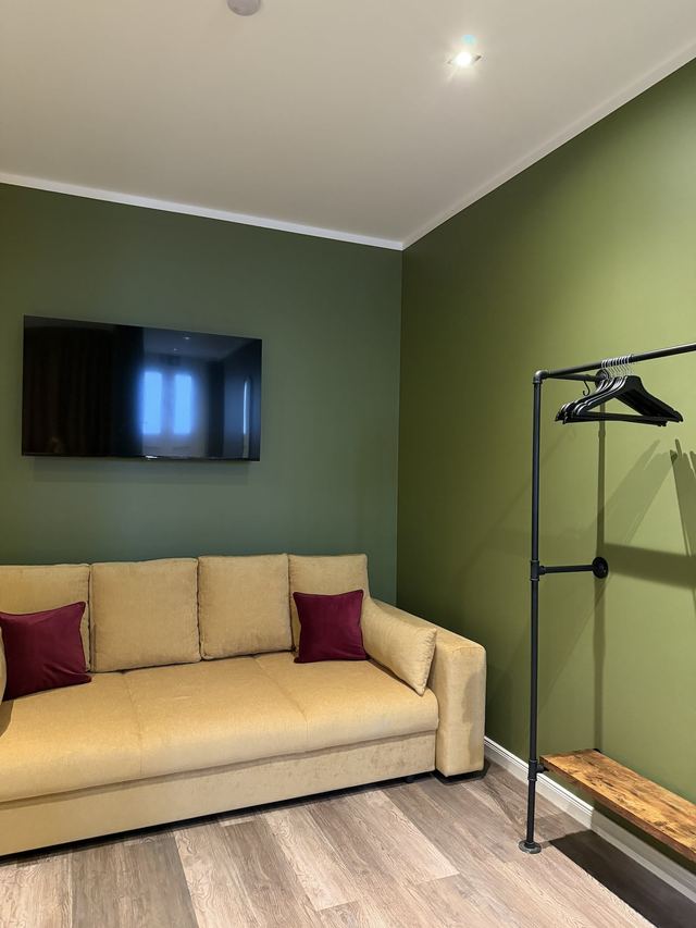 Wohnbereich mit Schlafsofa im Heaven in Berlin Apartment